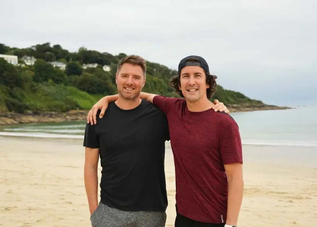 Two runners on Carbis Bay beach, Cornwall