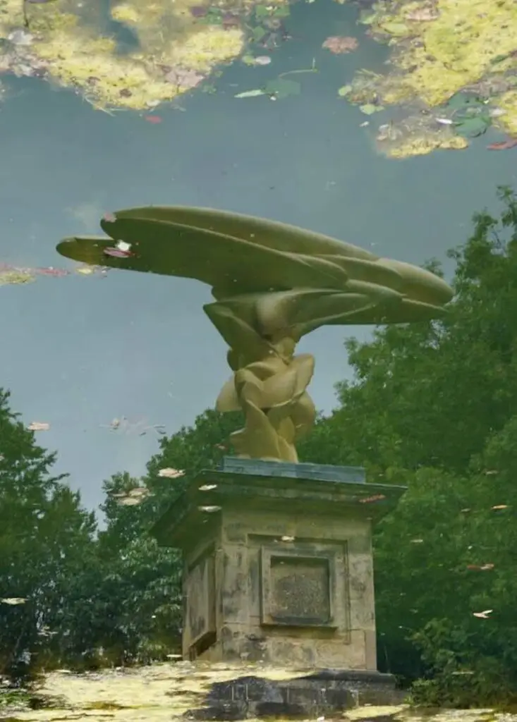 Reflection of a Tony Cragg sculpture in Ray Woods basin at Castle Howard